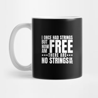 I once had strings but now am free, there are no strings on me Mug